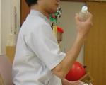 肘の曲げ伸ばし運動.jpg